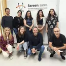 Fotografia grupal entre representants de Sareen Sarea i la Taula.
