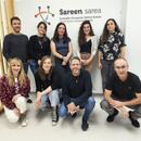 Fotografia grupal entre representants de Sareen Sarea i la Taula.