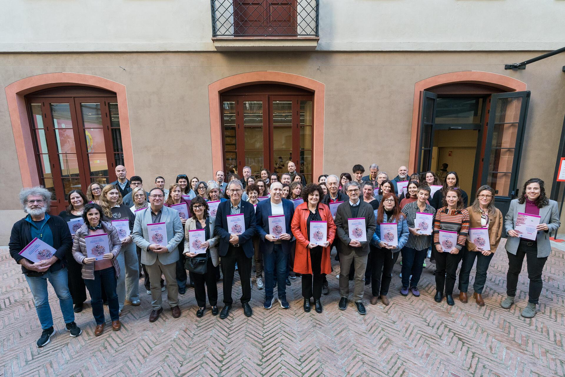 Fotografia grupal de les persones assistents a la jornada