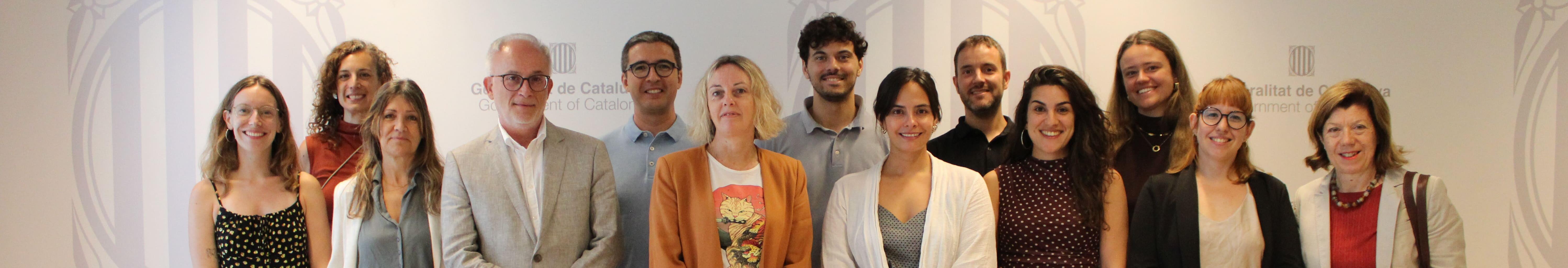 Imatge de l'equip tècnic i Junta Directiva de la Taula, integrants de FEDAIA i Fundació Pere Tarrés amb la Delegació del Govern de la Generalitat a Brussel·les