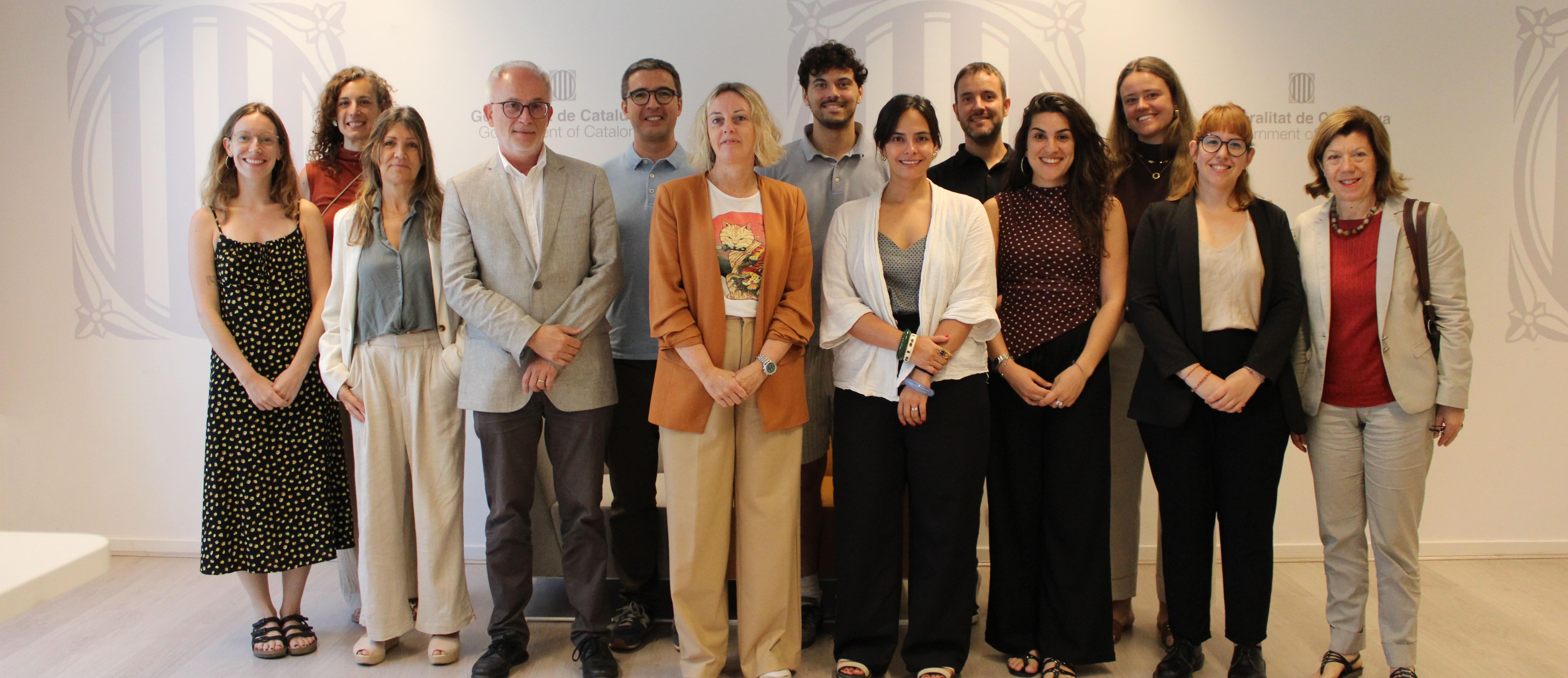 Imatge de l'equip tècnic i Junta Directiva de la Taula, integrants de FEDAIA i Fundació Pere Tarrés amb la Delegació del Govern de la Generalitat a Brussel·les