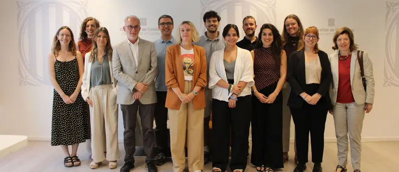 Imatge de l'equip tècnic i Junta Directiva de la Taula, integrants de FEDAIA i Fundació Pere Tarrés amb la Delegació del Govern de la Generalitat a Brussel·les
